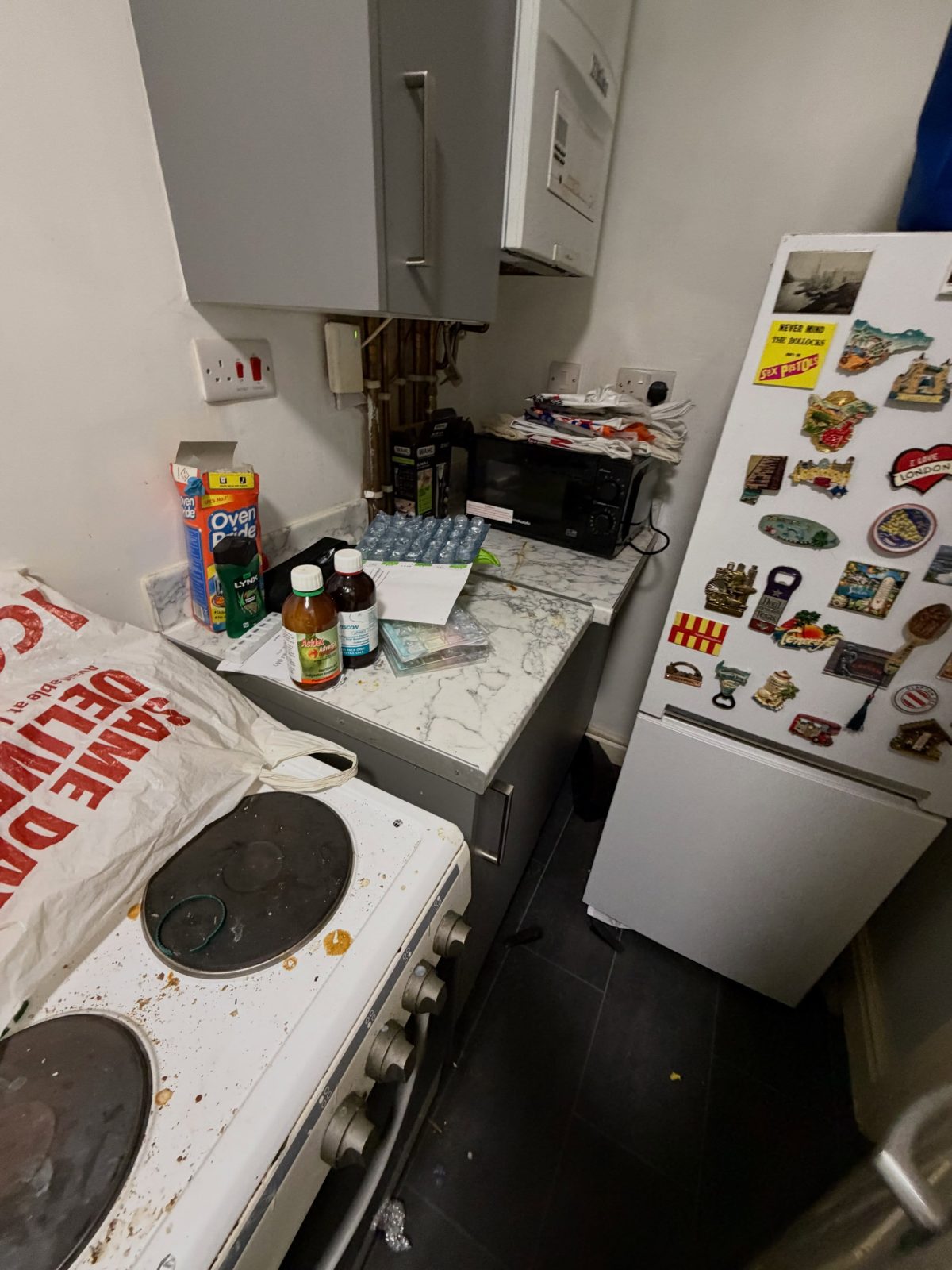 A cluttered kitchen before a clean and organise job